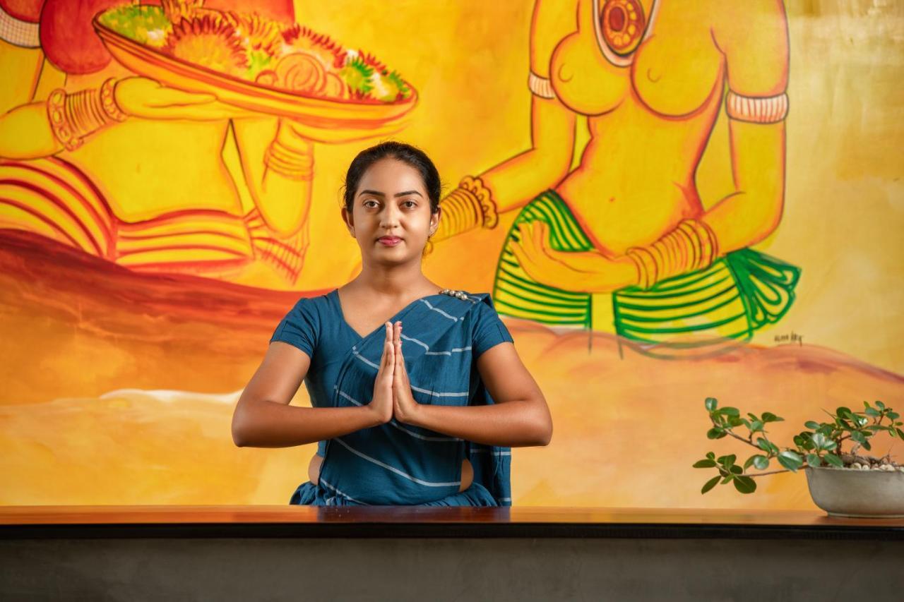 Atha Resort Sigiriya Exterior foto A woman greeting with Namaste